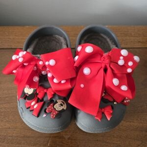 CROCS Kids Gray Slippers with Red Bow